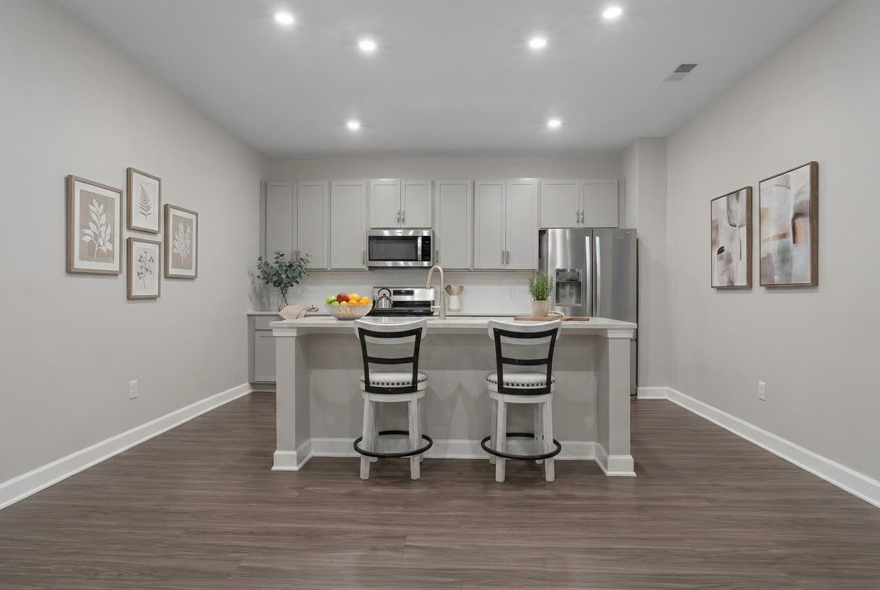 Kitchen with stainless appliances and peninsula seating at 138 Millbrook Drive